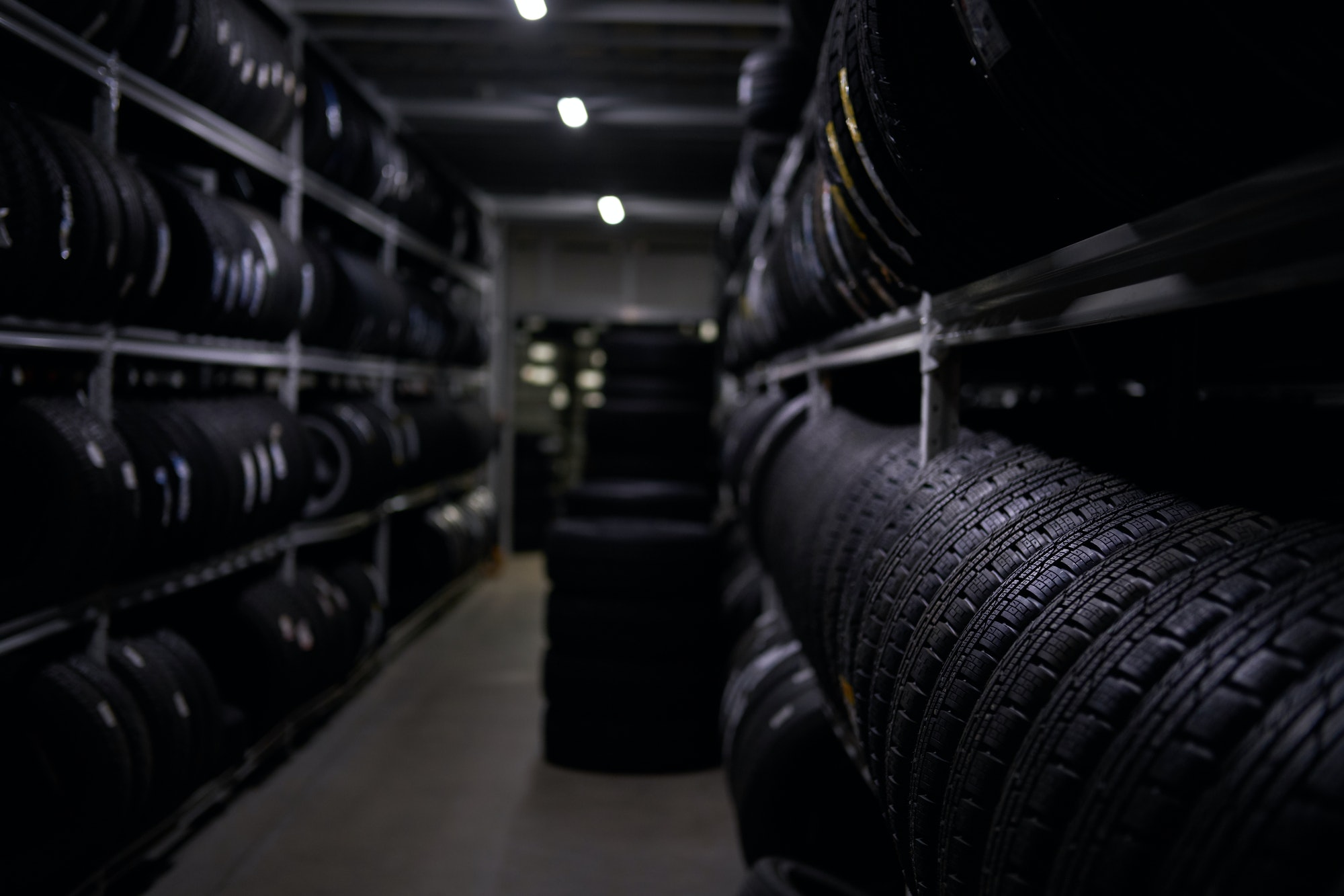 Variety of tyres at busy warehouse